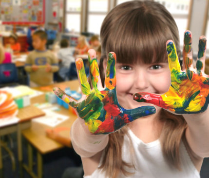 kid showing her hands