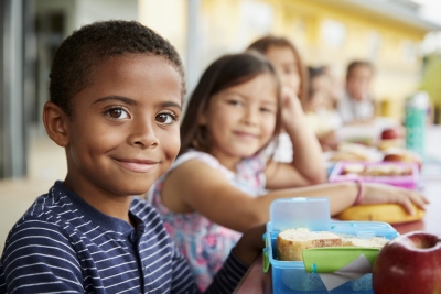 young boys and girls smiling